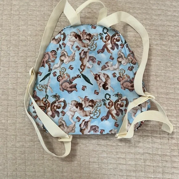 JanSport Half Pint Blue Cherub Print Backpack - Picture 3 of 3